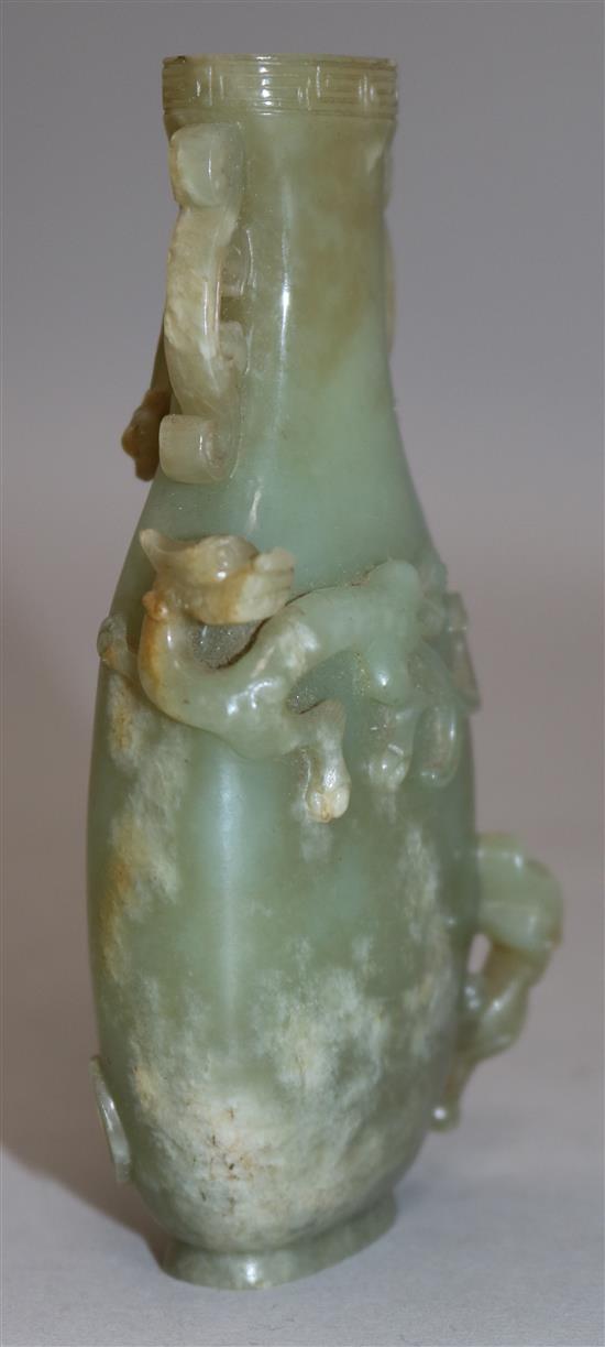 A Chinese archaistic celadon jade vase, Qianlong / Jiaqing period, 11.4cm